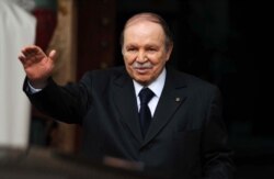 FILE - Then-Algeria's President Abdelaziz Bouteflika is seen gesturing in Algiers, Jan. 14, 2013.