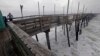 Fuertes oleaje comienza a azotar el muelle de pesca Avalon en Kill Devil Hill, Carolina del Norte, el jueves, 13 de septiembre de 2018, mientras se aproxima el huracán Florence.