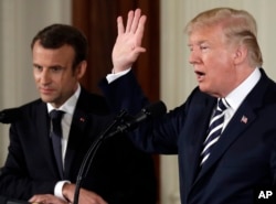 President Donald Trump speaks during a news conference with French President Emmanuel Macron in the East Room of the White House, April 24, 2018, in Washington.