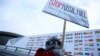 Environmental activist protests against fossil fuel in front of the the venue of the COP24 UN Climate Change Conference 2018 in Katowice, Poland, Dec. 10, 2018. (Agencja Gazeta/Grzegorz Celejewski via Reuters)