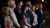 Family members of American citizens killed in Syria by members of an Islamic State group stand before the news media following a hearing at the U.S. Courthouse in Alexandria, Va., Sept. 2, 2021. 