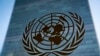 FILE - The symbol of the United Nations is displayed outside the Secretariat Building, Feb. 28, 2022, at United Nations headquarters.