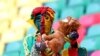 FILE - A Cameroon fan in the stands before the match Cameroon v Ethiopia, at Olembe Stadium in Yaounde, Jan. 13, 2022.