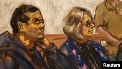 FILE - Chen Jinping sits with attorney Susan Kellan after his arrest for allegedly operating a Chinese "secret police station" in Manhattan's Chinatown, during a hearing at a Brooklyn courthouse in New York, April 17, 2023 in this courtroom sketch. 