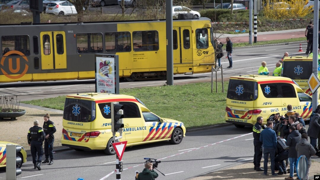 Ambulances are seen next to a tram after a shooting in Utrecht, Netherlands, March 18, 2019. 