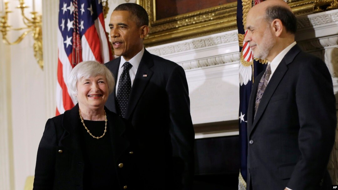 President Barack Obama applauds as he walks out of the State Dining Room of the White House with outgoing Federal Reserve Chairman Ben Bernanke (R) and Janet Yellen, his nominee to replace Bernanke, in Washington, Oct. 9, 2013.