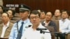 Former police chief Wang Lijun speaks during a court hearing in Chengdu in this still image taken from video September 18, 2012. 