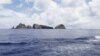 A group of disputed islands known as Senkaku in Japan and Diaoyu in China is seen from the city government of Tokyo's survey vessel in the East China Sea, September 2, 2012.