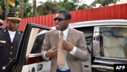 FILE - Teodorin Nguema Obiang, the son of Equatorial Guinea's president Teodoro Obiang and the country's vice-president in charge of security and defense, arrives at Malabo's Cathdral to celebrate his 41st birthday, June 25, 2013. 