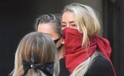 Amber Heard arrives at the High Court in London, Britain July 7, 2020.