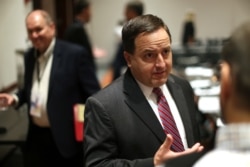 FILE - Jay Ashcroft, the Republican secretary of state in Missouri, answers a question during a convention of state secretaries of state in Philadelphia, July 14, 2018.