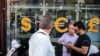  An Iranian currency exchange shop appears in this photo published, Sept. 4, 2018, by Iran's Tasnim news agency, in a report about one of Tehran's main currency exchange streets. 