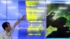 Earthquake and Volcano of the Korea Monitoring Division Director Ryoo Yong-gyu speaks in front of a screen showing seismic waves that were measured in South Korea, in Seoul, South Korea, Sept. 9, 2016. 