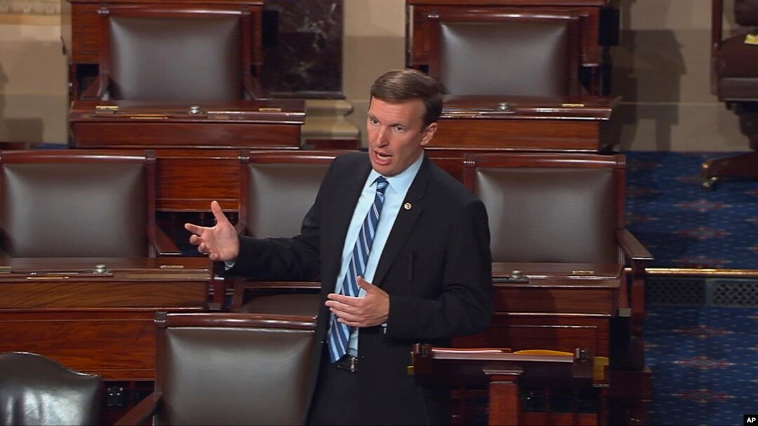 FILE - Sen. Chris Murphy speaks on the floor of the Senate on Capitol Hill, June 15, 2016, during a filibuster demanding a vote on gun control measures.