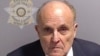 Giuliani se entrega en Georgia como coacusado de Trump en caso de interferencia electoral 
