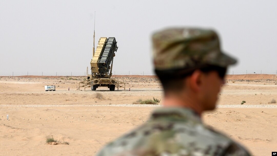 A member of the U.S. Air Force stands near a Patriot missile battery at the Prince Sultan air base in al-Kharj, central Saudi Arabia, Thursday, February 20, 2020. Pompeo met with King Salman in the capital, Riyadh, on Thursday. (Andrew Caballero…