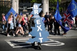 FILE: A pro-Brexit supporter is seen outside the Parliament in London.