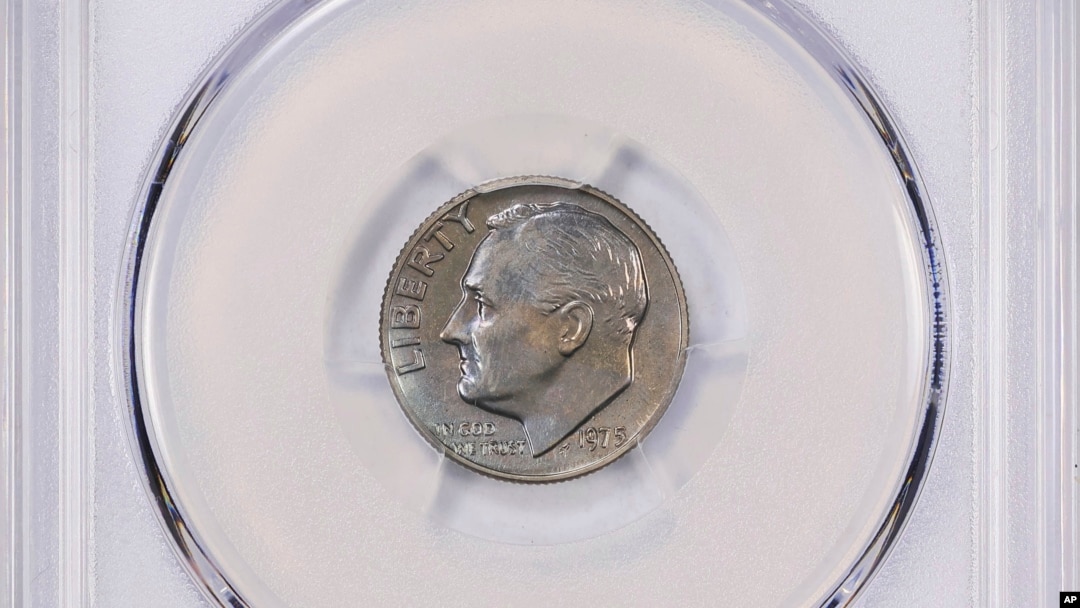 FILE - This undated image provided by GreatCollections shows a 1975 proof set dime mistakenly made without the San Francisco Mint's letter S mintmark. (GreatCollections via AP)
