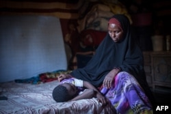 FILE - Amran Mahamood used to circumcise young girls in Hargeysa, Somalia, but stopped after a religious leader convinced her the rite was not required by Islamic law.