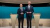Social Democratic Party Chancellor Olaf Scholz and his conservative rival of the Christian Democratic Union Friedrich Merz are pictured in a studio of the ARD and ZDF television broadcasters ahead of their first TV debate in Berlin, Germany, Feb. 9, 2025.