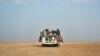 FILE - Nigeriens and third-country migrants head toward Libya from Agadez, Niger, June 4, 2018.
