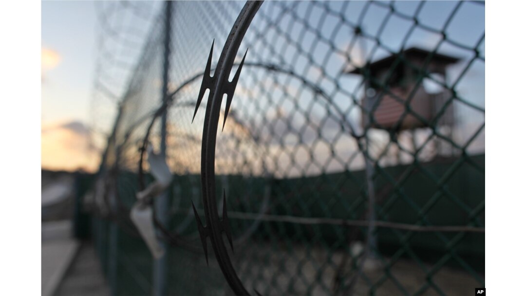 FILE - The sun rises over the Guantanamo detention facility at the Guantanamo Bay U.S. Naval Base, Cuba, May 13, 2009.