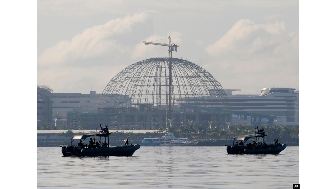 Patrol boats of the Philippine Navy Special Operations Group are positioned near the venue as they implement a no-sail zone policy at the restricted zone for next week's APEC (Asia-Pacific Economic Cooperation) Summit of Leaders Friday, Nov. 13, 2015.