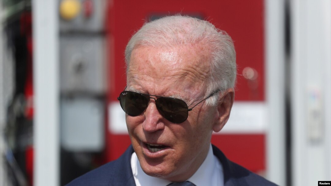 FILE - U.S. President Joe Biden speaks as he tours the facilities of the Flatirons Campus Laboratories and Offices of the National Renewable Energy Laboratory (NREL), in Arvada, Colorado, Sept. 14, 2021.