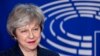 British Prime Minister Theresa May is welcomed by European Parliament President Antonio Tajani before their meeting at the European Parliament in Brussels, Feb. 7, 2019. 