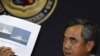 Philippine Navy flag officer-in-command vice admiral Alexander Pama presents to the media an undated file photo of a Chinese surveillance ship which blocked a Philippine Navy ship from arresting Chinese fishermen, April 11, 2012.