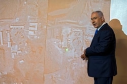 FILE - Israeli Prime Minister Benjamin Netanyahu speaks during a press conference at the foreign ministry in Jerusalem, Sept. 9, 2019.