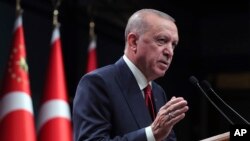 FILE - Turkish President Recep Tayyip Erdogan speaks after a Cabinet meeting, in Ankara, Turkey, Oct. 11, 2021.