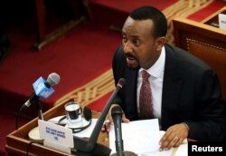 FILE - Ethiopia’s prime minister, Abiy Ahmed, addresses the members of parliament inside the House of Peoples’ Representatives in Addis Ababa, Ethiopia, April 19, 2018.