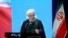 In this photo released by the official website of the Office of the Iranian Presidency, President Hassan Rouhani speaks in a meeting in Tehran, Iran, Dec. 4, 2019. 