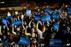 Supporters cheer during a campaign rally for Democratic presidential candidate Bernie Sanders, I-Vt., at Hunters Point park, April 18, 2016, in the Queens borough of New York.