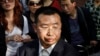 FILE - Human rights activist Jiang Tianyong speaks to journalists in Beijing, China, May 2, 2012. Jiang detained in connection with a sweeping crackdown on lawyers and activists stood trial Aug. 22, 2017, on charges of subversion of state power.
