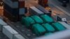 Six of nine armored troop carriers, which belong to Singapore, detained at a container terminal in Hong Kong, Nov. 24, 2016.