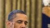 President Barack Obama talks on the phone with Prime Minister David Cameron of the United Kingdom in the Oval Office, Saturday, June 12, 2010.