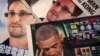Photos of Edward Snowden, a contractor at the National Security Agency (NSA), and U.S. President Barack Obama are printed on the front pages of local English and Chinese newspapers in Hong Kong, June 11, 2013.