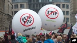 People demonstrate against the TTIP and CETA trade agreements in Leipzig, Germany, Sept. 17, 2016. Thousands of people are rallying in cities across Germany to protest against planned European Union trade deals with the United States and Canada. 
