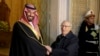 Tunisian President Beji Caid Essebsi, right, shakes hands with Saudi Crown Prince Mohammed bin Salman in Carthage near Tunis, Nov. 27, 2018. The crown prince is visiting allies in the Middle East before heading to a G-20 summit in Argentina later this week.