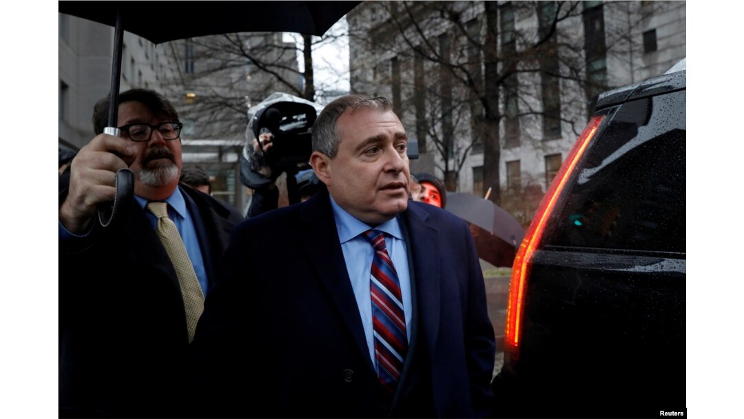 FILE - Lev Parnas, associate of President Donald Trump's personal lawyer Rudy Giuliani, exits after a bail hearing at the Manhattan Federal Court in New York, Dec. 17, 2019.