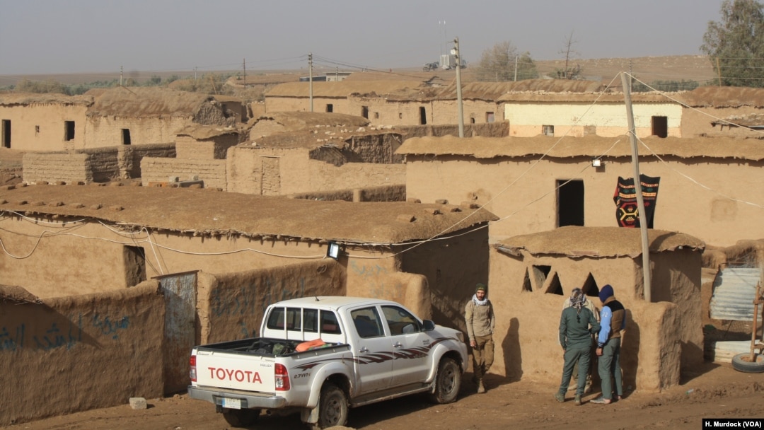 This village, abandoned after IS militants took over the area, is a temporary headquarters for Hashd Shaabi forces fighting their way to the strategic city of Tal Afar, in Delawaya, Iraq, Dec. 17, 2016.