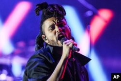 The Weeknd performs at the 2015 We Can Survive Concert at the Hollywood Bowl, Oct. 24, 2015, in Los Angeles.