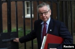 FILE - Britain's Secretary of State for Environment, Food and Rural Affairs Michael Gove leaves 10 Downing Street in London, May 22, 2018.