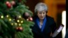 Britain's Prime Minister Theresa May leaves 10 Downing Street for Prime Minister's Questions at the House of Commons, in London, Dec. 19, 2018. 