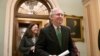 Senate Majority Leader Mitch McConnell, R-Ky., leaves the chamber after announcing an agreement in the Senate on a two-year, almost $400 billion budget deal, at the Capitol in Washington, Feb. 7, 2018. 