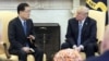 South Korea's national security chief Chung Eui-yong briefs U.S. President Donald Trump at the Oval Office about his visit to North Korea, in Washington, March 8, 2018.
