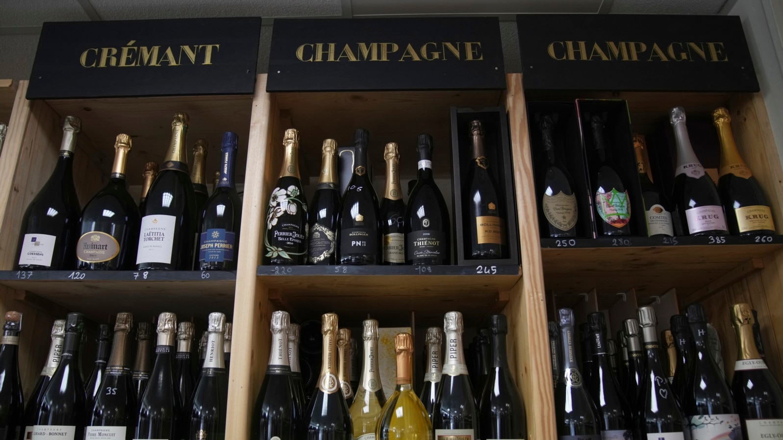 Bottles of Champagne are for sale at a shop in Ville d'Avray, outside Paris, as President Donald Trump threatened a 200% tariff on European wine, Champagne and spirits if the European Union goes forward with a planned tariff on American whiskey, March 13, 2025.