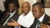 FILE - Uganda opposition leaders, from left to right: Forum for Democratic Change, Dr. Kizza Besigye, former Prime Minister Amama Mbabazi and Democratic Party President Norber Mao meeting at the Democratic Alliance office in Kampala, Sept. 18, 2015.